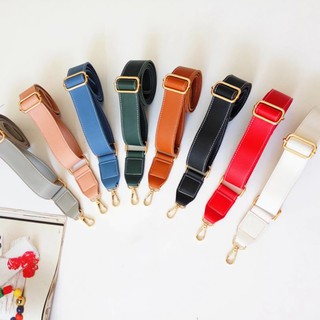 ภาพหน้าปกสินค้าสายกระเป๋า สาย PU สีพื้น หนังนิ่ม 🌈 PU classic strap 🌈 สายหนัง PU ปรับระดับได้ ที่เกี่ยวข้อง