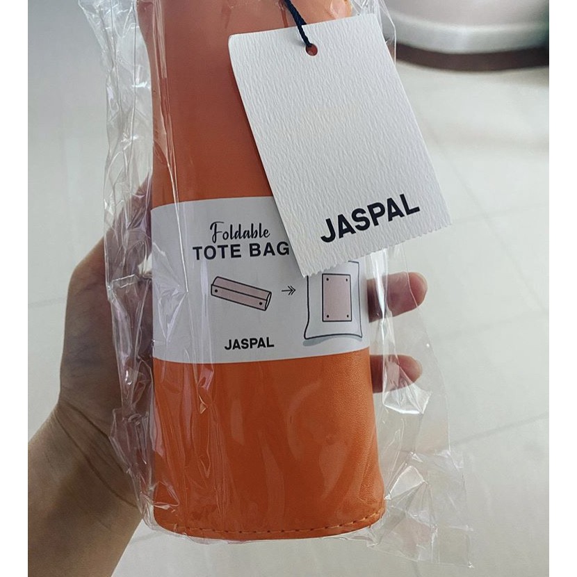 กระเป๋าหิ้ว-jaspal-สีส้ม-สำหรับคนชอบสีสันสดใส-เเกะคลี่ออกมาได้ตามรูป-ใหม้ป้ายห้อยเลย