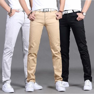 กางเกงขายาวของผู้ชายกางเกงยีนส์เกาหลีแบบบางส่วนของกลางขึ้นกางเกงสบาย ๆ ของบุรุษ