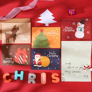 ภาพหน้าปกสินค้าการ์ดของขวัญ คริสต์มาส 6 ชิ้น  พร้อมซองจดหมาย โปสการ์ด ปีใหม่ ที่เกี่ยวข้อง