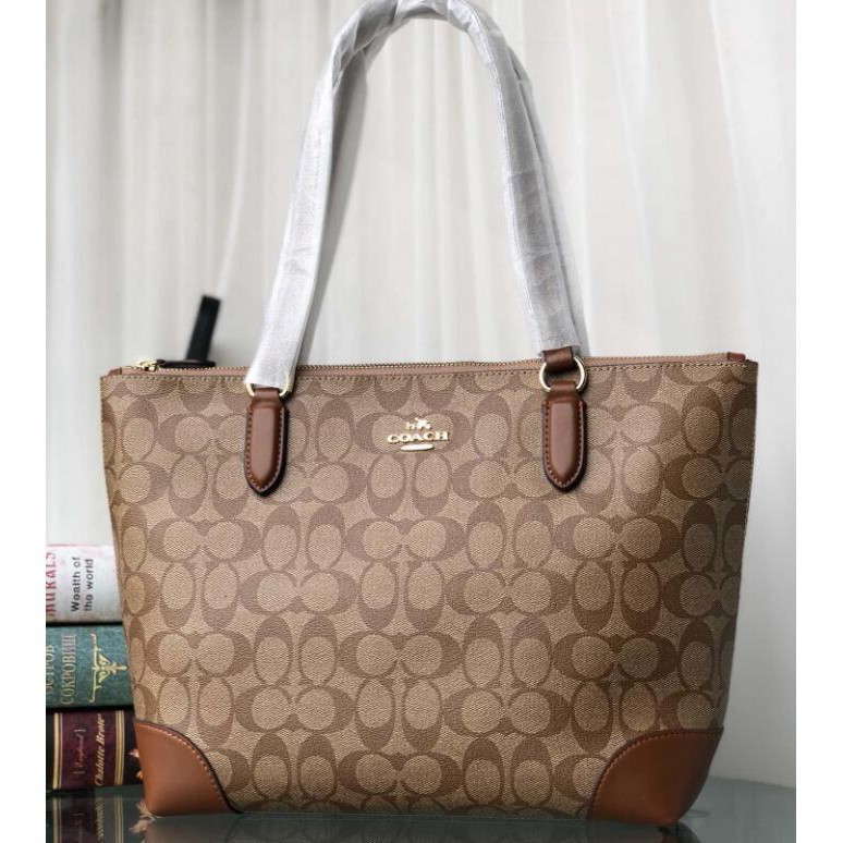 coach tote logo Cinosural International School