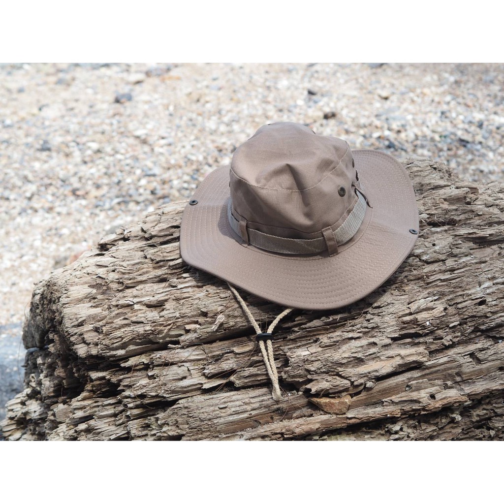 ภาพหน้าปกสินค้าหมวกบักเก็ตหมวกเดินป่าหมวกแคปปิ้งใส่สบายเนื้อผ้าคอตอตน100%ไม่ว่าจะทะเลภูเขาใส่กันน้ำกันฝนหมวกระบายอากาศได้ดีรอบหมวก60cm
