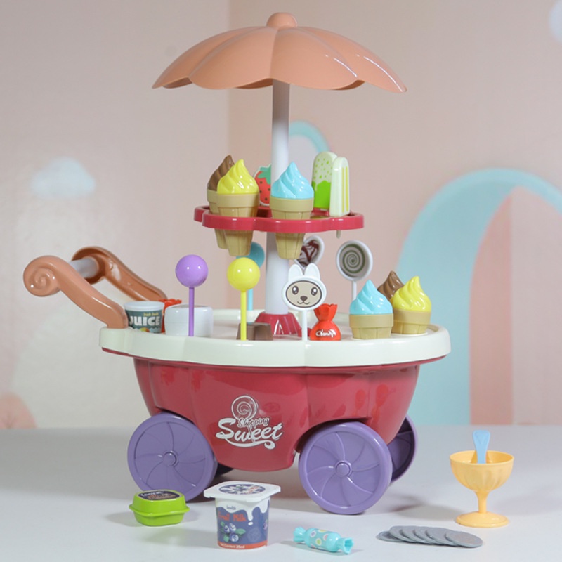 ร้านขายไอศกรีม-ร้านขายลูกอบ-รถแขนขายของหวานจำลอง-light-rotating-candy-trolley-girl-playset