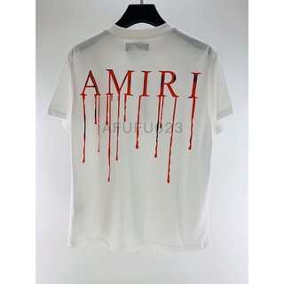 ภาพหน้าปกสินค้าAmiri เสื้อยืดแขนสั้นลําลอง พิมพ์ลายตัวอักษรกราฟฟิติ ทรงหลวม สไตล์สตรีท แฟชั่นฤดูร้อน ซึ่งคุณอาจชอบราคาและรีวิวของสินค้านี้