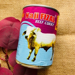 ภาพหน้าปกสินค้าเนื้อกระป๋อง เนื้อวัวกระป๋องพม่ารสแกงกะหรี่ Haji FIZAL BEEF CURRY ที่เกี่ยวข้อง