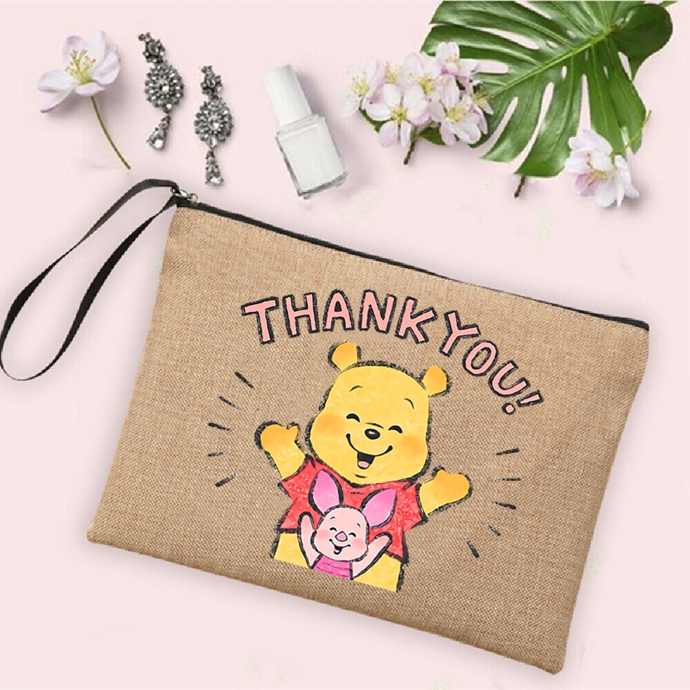 ภาพสินค้ากระเป๋าถือ กระเป๋าคลัทช์ ผ้าลินิน พิมพ์ลายหมีพูห์น่ารัก เหมาะกับของขวัญ สําหรับใส่เครื่องสําอาง กุญแจโทรศัพท์ จากร้าน kfcjunjun2022.th บน Shopee ภาพที่ 4
