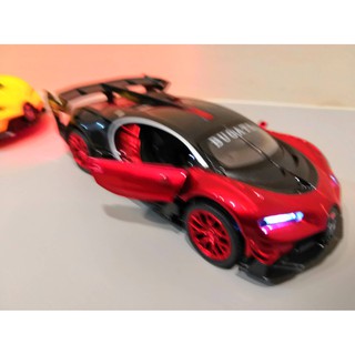 ภาพหน้าปกสินค้าโมเดลรถยนต์ 2019 Bugatti GT Super Car  ทำจากเหล็ก สัดส่วน 1:32 ประตูซ้ายขวา  เปิดได้ มีเสียง มีไฟ ล้อฟรีวิ่งได้ ที่เกี่ยวข้อง