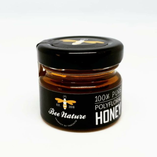ภาพหน้าปกสินค้าน้ำผึ้งดอกไม้ป่าแท้100% 30ก. ตราบีเนเจอร์ Bee Nature สามารถเป็น ของฝาก ของชำร่วยงานแต่งงาน จากร้าน thachitaglobaltrading บน Shopee