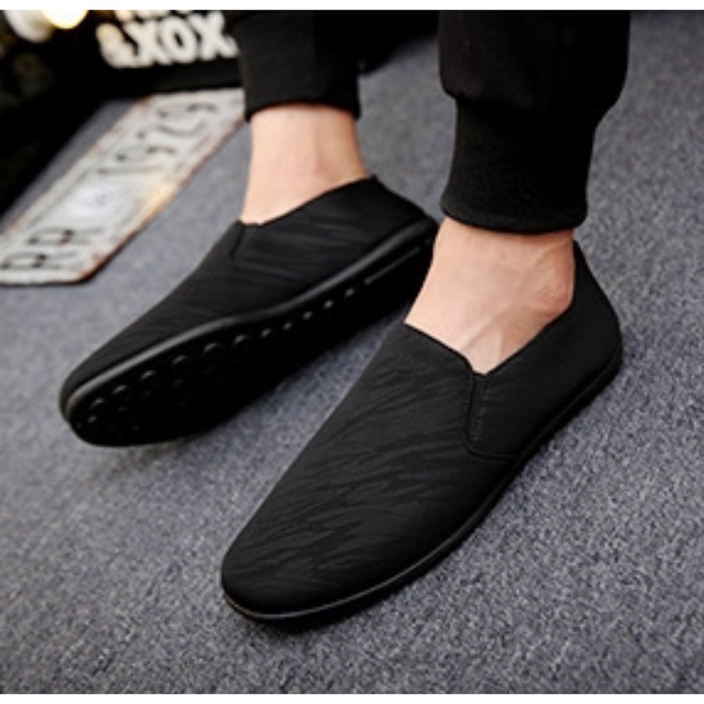 ภาพหน้าปกสินค้าMarian รองเท้าผ้าใบผุ้ชาย รองเท้าลำรองผู้ชายรุ่นใหม่ใมี3สี ดำ เทา กรม No.A072 จากร้าน marian.shop บน Shopee