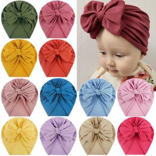 (พร้อมส่งจากไทย) หมวกแขกผ้ายืดสำหรับเด็กเล็กทารกแรกเกิดสีพื้นแต่งลายโบว์