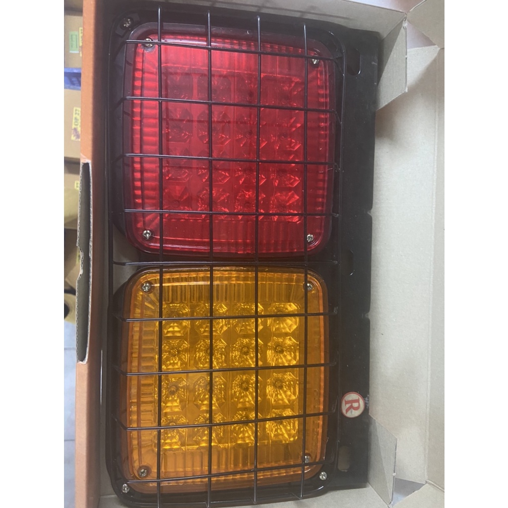 ไฟท้ายสี่เหลี่ยม-led-2ตอน-led-12v-24v-ในรูป-1ชิ้น-มีตะแกรง-มีแป้นกรอบเหล็ก-เคลือบรมดำ-รถปิคอัพ-รถบรรทุก