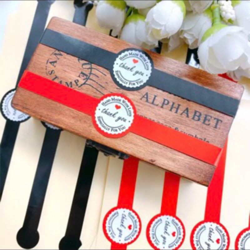สติ๊กเกอร์ตกแต่งสติกเกอร์ติดกล่องthank-youยาว18ซ-มมีสีดำและสีแดงแพ็คละ50ดวง