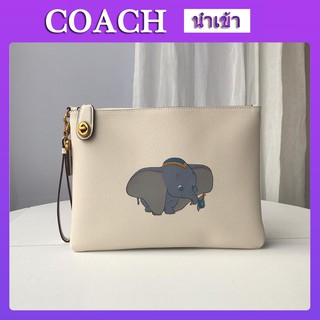 Coach F69198 ดัมโบ้พิมพ์หนังดิสนีย์บิดล็อคมือหญิงถือกระเป๋า  กระเป๋าสตรี