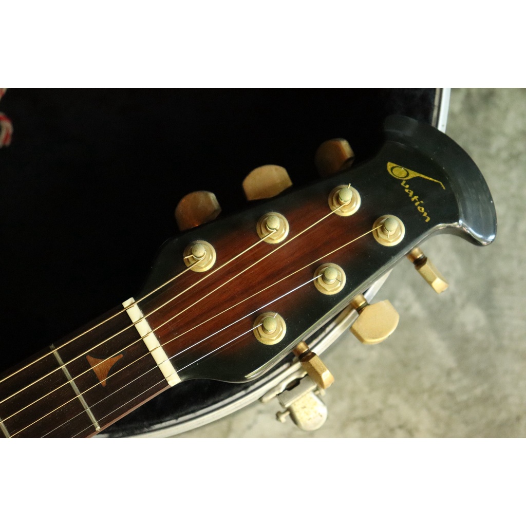 โลโก้หัวกีต้าร์-ovation-guitar-usa-gold-metallic