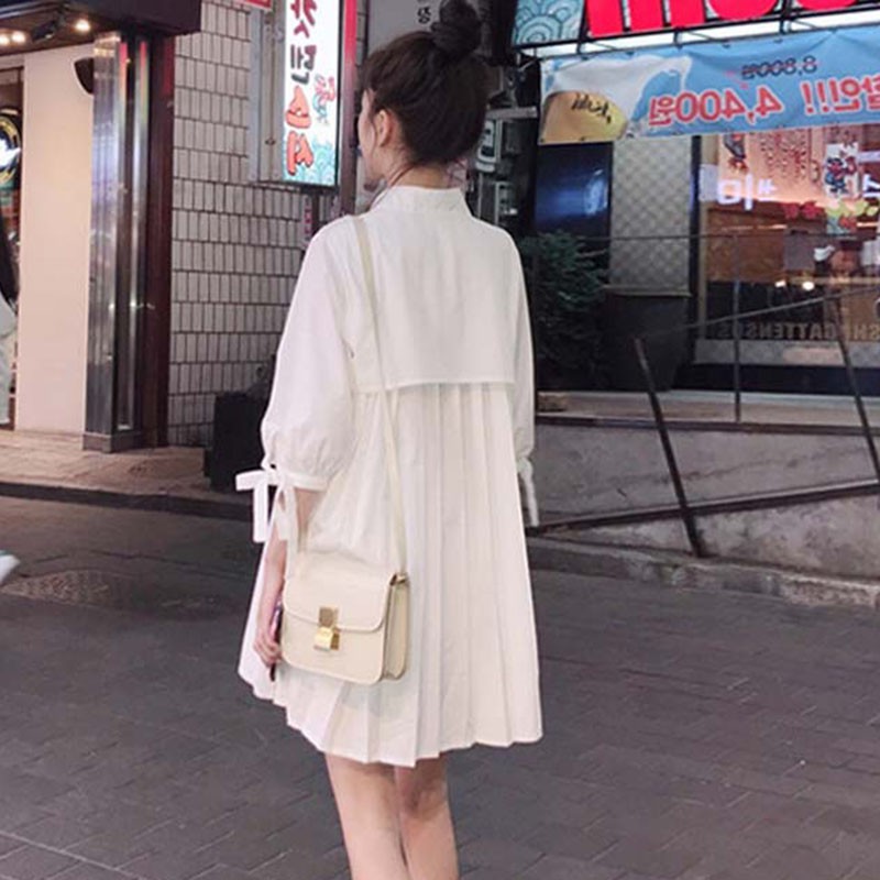 ภาพหน้าปกสินค้าPB7385เสื้อตัวยาวสีขาวน่ารักมากๆ เดรสเสื้อพลีทแฟชั่นเกาหลี เสื้อทรงหลวมครึ่งแขน จากร้าน _3xh_wqllf บน Shopee