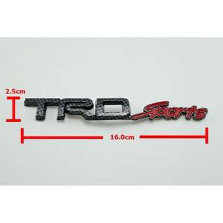 ป้ายโลโก้พลาสติกTRD SPORTเคฟล่า สีดำ/แดงขนาด 16x2.5cm ติดตั้งด้วยเทปกาวสงหน้าด้านหลัง