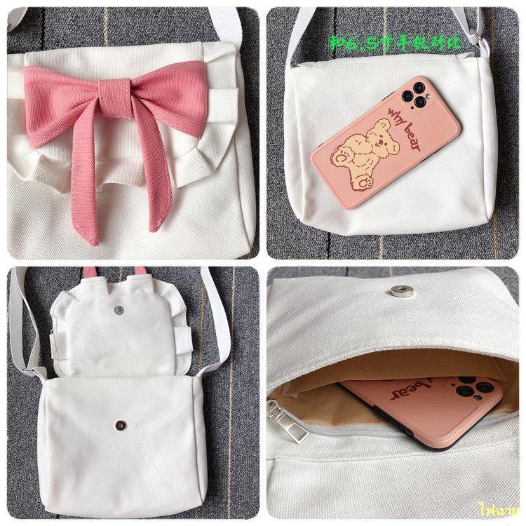 hot-sale-lolita-retro-sweet-bow-soft-girl-canvas-bag-korean-ins-girl-heart-messenger-bag-jk-bag-กระเป๋า