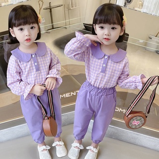 ภาพหน้าปกสินค้าชุดเด็กผู้หญิง ใหม่ 2021 เสื้อผ้าเด็กสไตล์เกาหลี เสื้อแขนยาว + กางเกงขายาว ชุดเซ็ทสองชิ้น ซึ่งคุณอาจชอบสินค้านี้