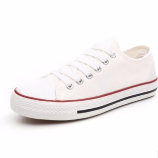 ภาพขนาดย่อของภาพหน้าปกสินค้ารองเท้าผ้าใบสีขาวแถบแดง จากร้าน baobeishop. บน Shopee
