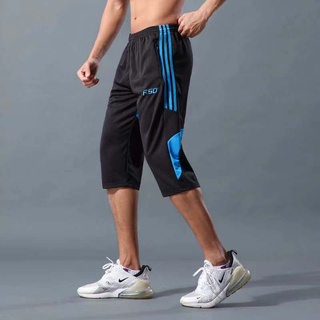 ภาพหน้าปกสินค้ากางเกงฝึกซ้อมฟุตบอลชายกระเป๋าสองข้างครอบตัดขาฟุตบอลวิ่งกางเกงกีฬาฟิตเนส ที่เกี่ยวข้อง