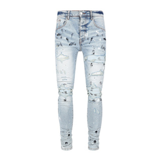 AMIRI High Street Fashion Mens Jeans วินเทจสีฟ้าอ่อนบางภาพวาดฝีมือคุณภาพสูง Hip Hop ปุ่มกางเกงยีนส์สำหรับผู้ชาย