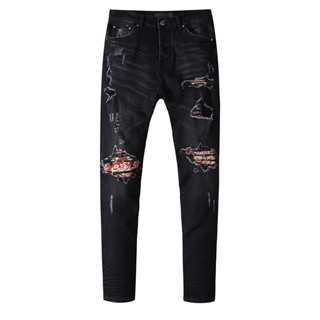 Amiri New High Street แฟชั่นผู้ชายกางเกงยีนส์สีดำวินเทจบางแพทช์พิมพ์ฮิปฮอปคุณภาพสูงปุ่มกางเกงยีนส์ผู้ชาย