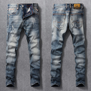 สไตล์ใหม่วินเทจแฟชั่นผู้ชายกางเกงยีนส์สีฟ้า Vintage Slim Fit เจาะเทคนิคเย็บปักถักร้อย กางเกงยีนส์ผู้ชายวินเทจ