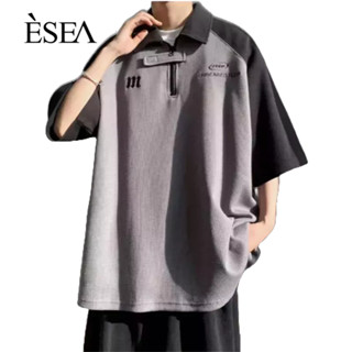 ESEA ผู้ชายแขนสั้นสไตล์ INS ใหม่หล่อเสื้อโปโลลําลองหลวมผู้ชายพิมพ์แขนสั้น