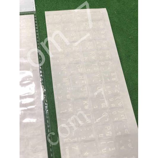 ภาพหน้าปกสินค้าสติกเกอร์คีย์บอร์ด พื้นสีใสตัวหนังสือขาว ภาษาไทย อังกฤษ /Thai English Keyboard sticker สติ๊กเกอร์ภาษาไทยอังกฤษ