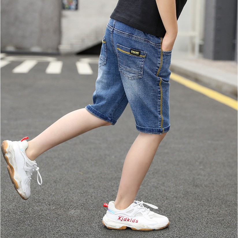 กางเกงยีนส์ขาสั้นเด็กโต-กางเกงยีนส์ขาสามส่วน-เอวยางยืด-เย็บด้ายเหลืองด้านข้าง