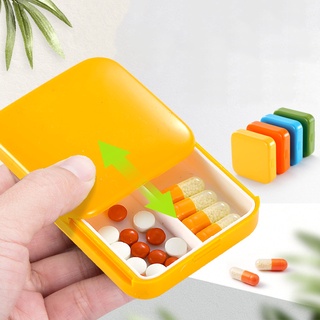 ภาพหน้าปกสินค้า1PC Portable 2 Grid Push Open Style Medicine Travel Pill Box ที่เกี่ยวข้อง