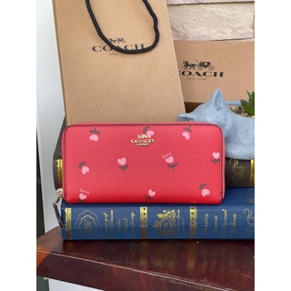 กระเป๋าสตางค์ COACH ACCORDION ZIP WALLET IN SIGNATURE CANVAS WITH HEART FLORAL PRINT