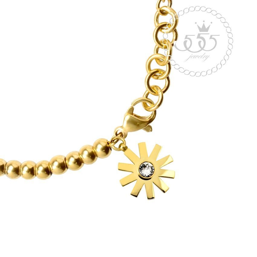 555jewelry-สร้อยข้อมือ-สแตนเลสสตีล-ประดับ-ชาร์มรูปดอกไม้-ประดับ-cz-รุ่น-mnc-br417-b-สี-yellow-gold