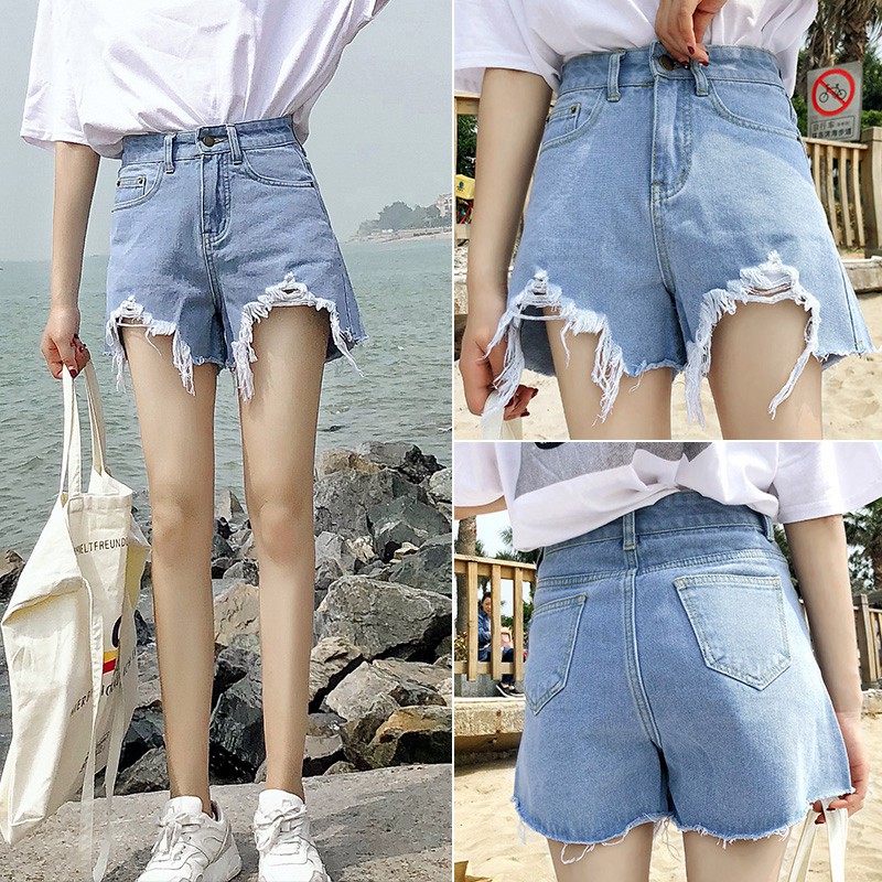 ภาพหน้าปกสินค้ากางเกงยีนส์แฟนชั่น ขาสั้น ปลายขาดเก๋ๆ สไตล์เกาหลี จากร้าน yunhuangshop บน Shopee