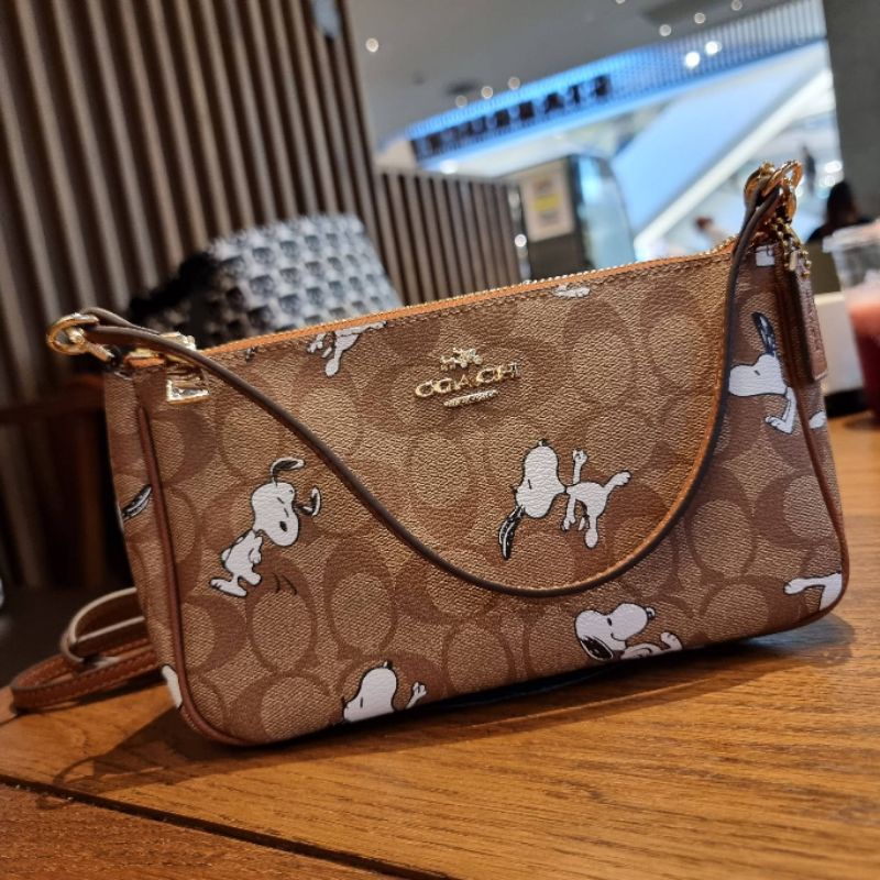 coach-top-handle-pouch-in-signature-with-snoopy-print