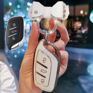 Roewe MG6 key case mg ZS hsezs MG5 EZS MG HS EV เคสกุญแจรถยนต์ พวงกุญแจ พวงกุญแจรถยนต์ กระเป๋าใส่กุญแจรถยนต์ ปลอกกุญแจรถยนต์  （ด้วยโบว์ผีเสื้อ）MG เคสกันกระแทกคุณภาพสูง