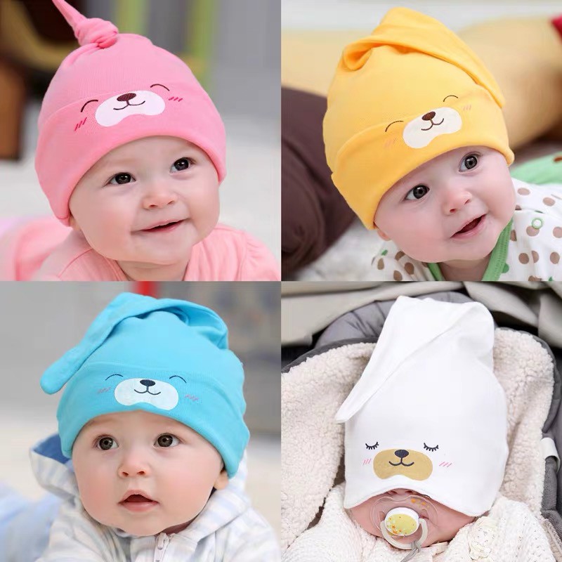 ภาพหน้าปกสินค้าหมวกหูกระต่ายพิมพ์ลายการ์ตูนน่ารัก สไตล์เกาหลี ผ้าคุณภาพดี นุ่มใส่สบาย เหมาะสำหรับเด็กทารกใส่นอน