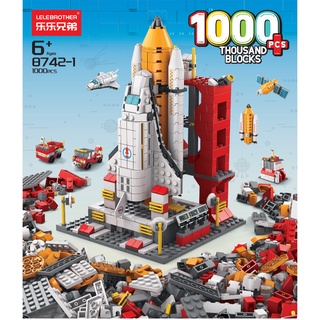 Building Block ของเล่น 1000 ชิ้นจรวดเรือบรรทุกเครื่องบินสีชมพูปราสาท DIY ประกอบของเล่นกว่า