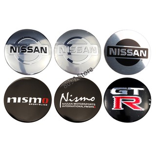 สติ๊กเกอร์ตราสัญลักษณ์รถยนต์ 56 มม. 4 ชิ้นสําหรับ nissan nismo gtr x - trail qashqai tiida altima