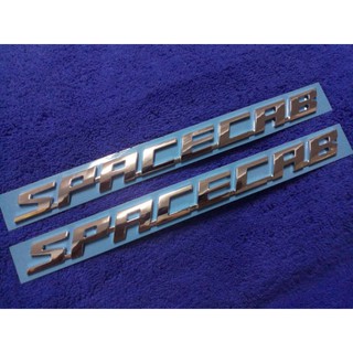ภาพหน้าปกสินค้าโลโก้ SPACECAB สีชุปโครเมี่ยม *ติดรถ ISUZU D-MAX 2020* (1.8×24cm) ราคาแพ็คคู่ 2ชิ้น ที่เกี่ยวข้อง
