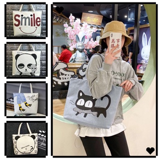 ภาพหน้าปกสินค้ากระเป๋าผ้า TOTE สไตล์ญี่ปุ่นกระเป๋าผ้านิ่ม.เนื้อผ้าดี.ใส่ของได้เยอะมีซิปด้วย. ที่เกี่ยวข้อง