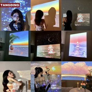 ภาพหน้าปกสินค้า【COD Tangding】โคมไฟโปรเจคเตอร์ ฉายรูปทิวทัศน์ทะเล สไตล์เกาหลี สําหรับถ่ายรูปเด็กผู้หญิง 8 แบบ ที่เกี่ยวข้อง