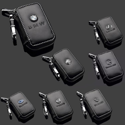 ภาพหน้าปกสินค้าพวงกุญแจ กระเป๋ากุญแจ รถยนต์ Leather PU Car Key Chain Holder Zipper Case Remote Wallet Bag - Black จากร้าน magicsoft บน Shopee