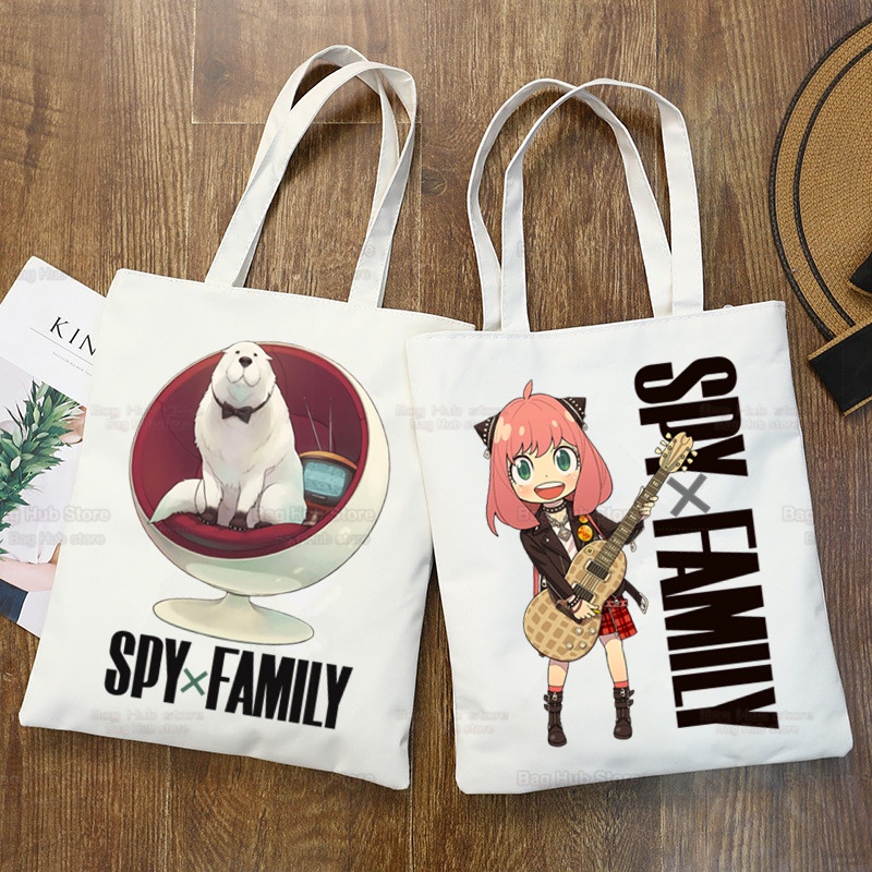 ภาพหน้าปกสินค้าSpyfamily กระเป๋าช้อปปิ้ง กระเป๋าสะพายไหล่ ผ้าแคนวาส ลายกราฟฟิคอนิเมะญี่ปุ่น ฮาราจูกุ Spy x Family