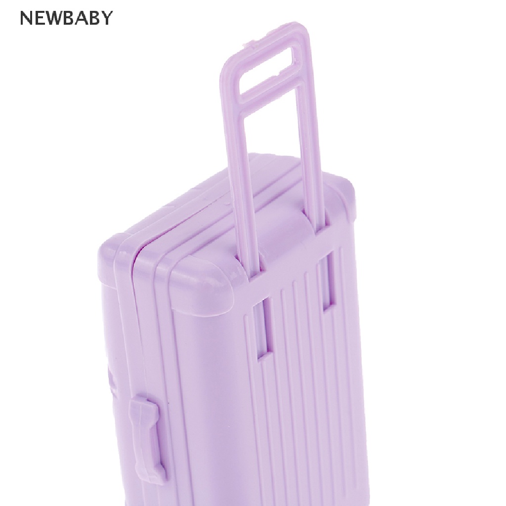 ภาพหน้าปกสินค้าNewbaby กระเป๋าเดินทางพลาสติก ขนาดเล็ก อุปกรณ์เสริม สําหรับบ้านตุ๊กตา 1 ชิ้น จากร้าน newbaby.th บน Shopee