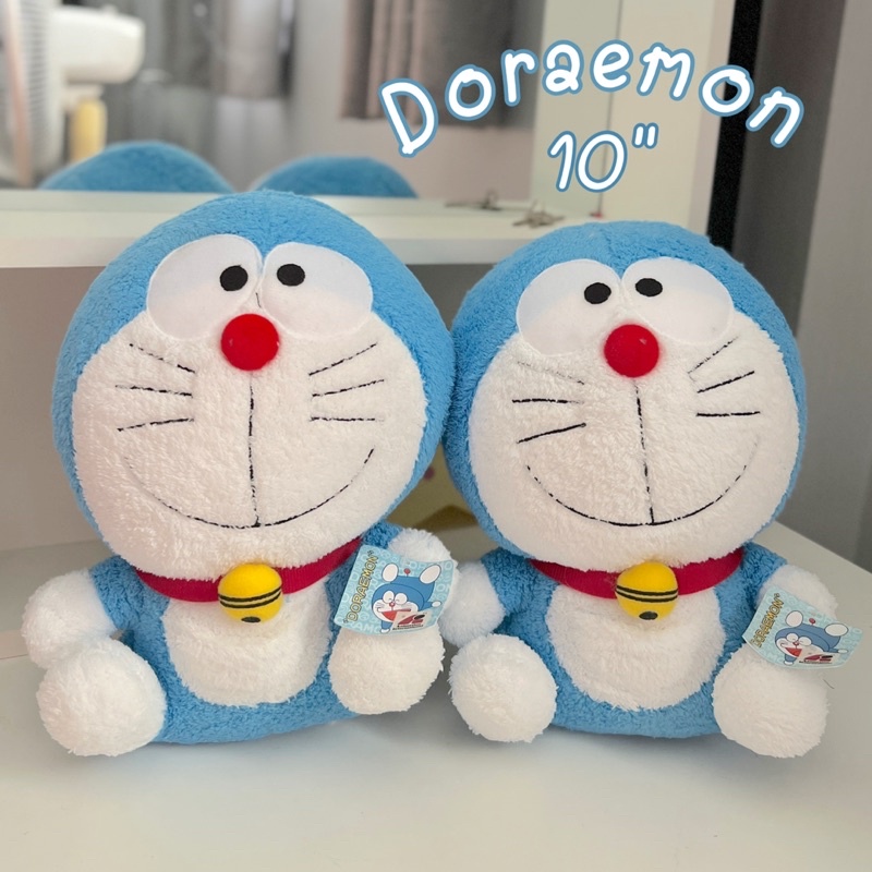 พร้อมส่ง-ตุ๊กตาโดเรมอน-ตุ๊กตาโดราเอมอน-รุ่นนั่งหัวโต-ขนาด-10-นิ้ว