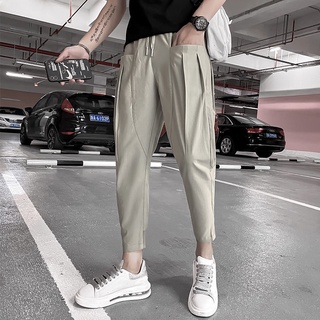 กางเกงลำลองผู้ชายMen s Slim Casual Pants Korean Version Trend Versatile Spirit Boy Small Feet Nine Points Men s Summer ส