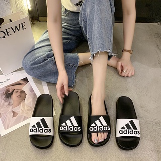 ภาพหน้าปกสินค้าใหม่ !! รองเท้าแตะผู้หญิง พร้อมส่ง ใส่สบาย นิ่มมาก รองเท้าแตะผู้ชาย Adidass พร้อมส่ง !! ที่เกี่ยวข้อง