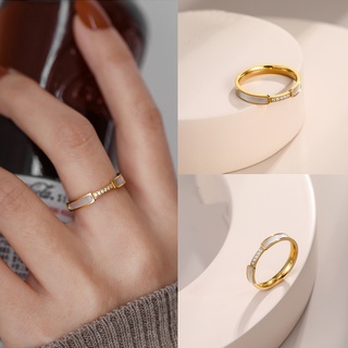 ภาพหน้าปกสินค้าแหวนสแตนเลส ประดับเพชร ป้องกันสนิม ที่ทนทาน สีทอง เครื่องประดับ สําหรับผู้หญิง งานแต่งงาน ที่เกี่ยวข้อง