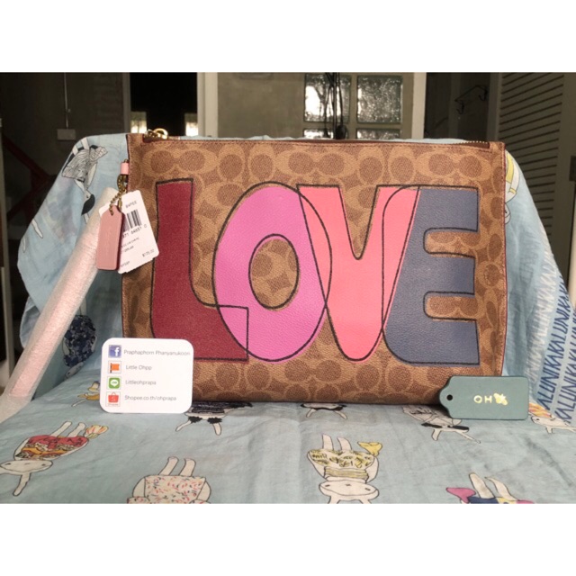 Charlie pouch in signature shop canvas with love print